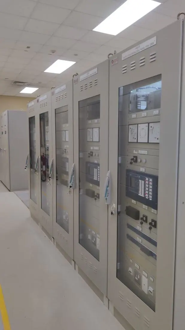 Row of protection relay and metering panels